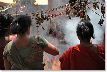 5.	 As we arrived smoke and flames announced prayers and offerings being made.