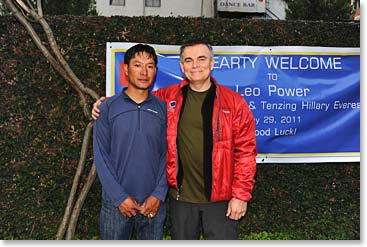 Leo and Nuru pose for a photo before leaving for the airport early this morning. 