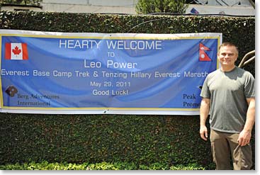 Leo with the welcome sign at Yak and Yeti Hotel