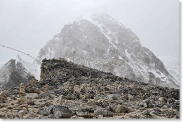 Prayer flags adorn the summit of Kala Patar