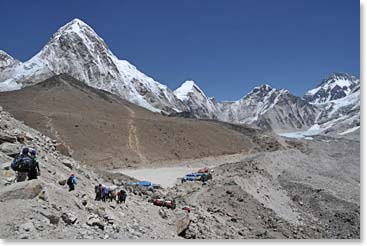 The barren slopes of Kala Pattar and the blue roofed lodges of Gorak Shep