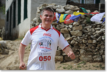 Looking strong, 8 hours 23 minutes, 20 seconds after he began running from Everest Base Camp.