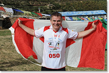 The proud Canadian sports his flag.