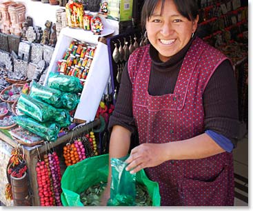 Local vender preparing bags of coca leaves