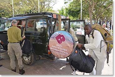 Unloading duffel bags from the international flights at Mt Meru Hotel in Arusha, Tanzania.