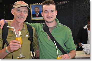 Pete and Adam enjoy their welcome drinks at the Mt Meru Hotel.