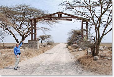 Jane Lynch at entry gate to Serengeti National Park
