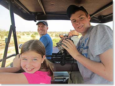 Katherine, Brennen and Scott are all smiles in the Land Cruiser.