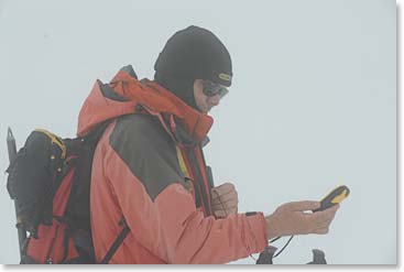 Vladimir checks his GPS receiver in the whiteout conditions we found above 5000 meters.