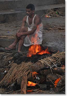 Tending a funeral pyre