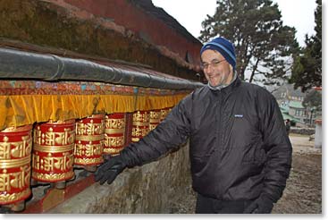 Larry turning prayer wheels