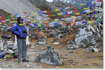 We put fresh khata blessing scarves and prayer flags on several memorials for friends and loved ones.... Bob paused for a few moments by Scott Fischer’s memorial, which had received a fresh coat of paint.