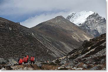 Porters climb the trail to Lobuche.