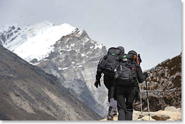 We climb higher to the terminal moraine of the Khumbu Glacier with Lochuche Peak before us.