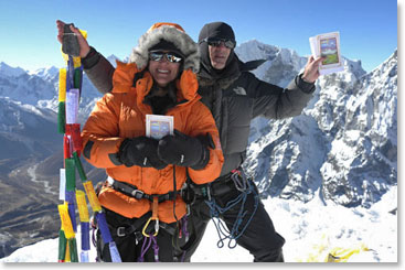 On the summit with cards, prayer flags and the mani stone from Lama Geshi
