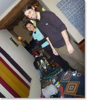 Andrew and Ana packing their gear for the upcoming climb
