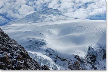The summit of Cayambe beaconed, even though the clouds did not portend the best of conditions ahead for us.