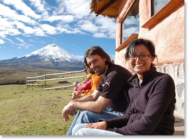 Ana and Andrew soak up some sun while Cotopaxi reveals herself behind them.