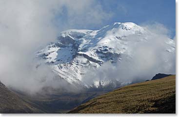 The day before the summit Chimborazo peaks out from behind the clouds.