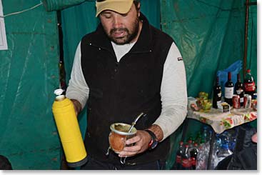 Our meals are served in a comfortable tent.  Juan the camp manager demonstrates how to make Mate de Coca to drink.