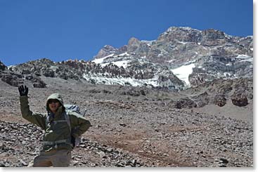 Winston with a breathless smile. Aconcagua above him.