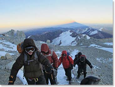 As Howard and the group climb above Berlin Camp on summit morning an ominous shadow of Aconcagua was cast behind us to the west.  You could see the plume of snow being blown from the summit by high winds.