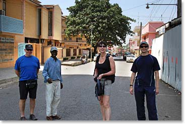 Julius leads the group on a walk through Arusha.