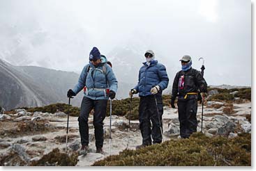 Joanne, Dave and their guide Min, heading down the trail.