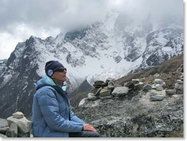 Joanne enjoys the view at Lobouche, along the Khumbu glacier with the mountain named Nuptse rising above.