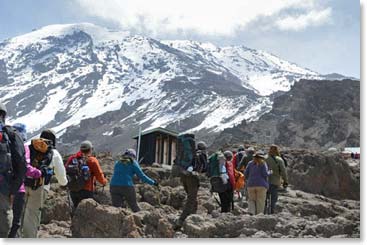 The team walking through Barafu Camp, bound for a snowy Kilimanjaro.