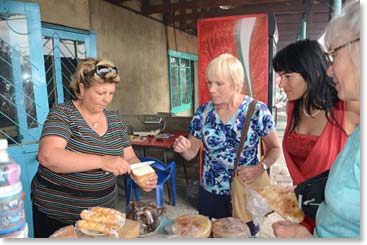 The girls sampling a local cheese.  We ended up buying fresh bread, cheese, fruits and Pringles Potato Chips for the drive.