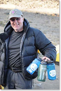 Joe needs to fill his water bottles before we hike