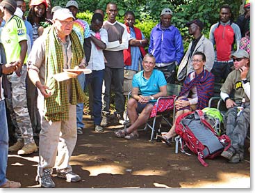 Wally presenting the tips to porters and staff