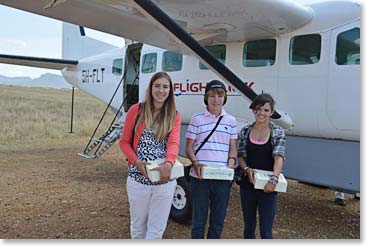 The kids ready to board. We took boxed lunches for the flight because we knew we would be too busy to eat when got back to Arusha.