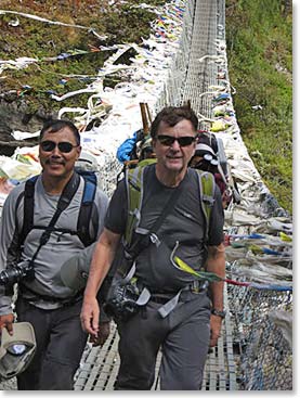 Temba and Clayton stepping off the bridge