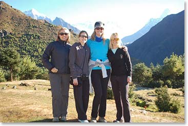 The girls enjoying the morning light with the big peaks behind