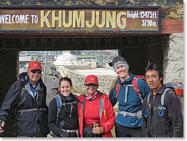 Jim, Liz, Sharon, Tina and Mingma at the “Welcome to Khumjung” sign yesterday.