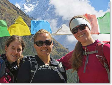 Liz, Lauren and Tina looked beautiful along the trail with prayer flags and mountains behind.