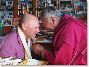 Wally and Geshe are old friends and they have a tradition of doing resounding “head bumps” when Wally receives his Khata.