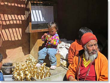 We were touched to see local children helping the caretaker clean the butter lamps.