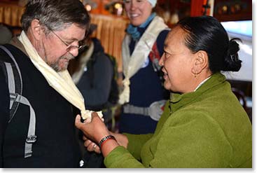 Gerry receives his Khata blessing scarf from Lakpa Doma before we depart.