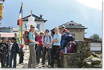 The happy end of a long trek: we waited for one another at the entrance to Lukla on when we arrived. It was bittersweet to think that our trekking life was coming to an end