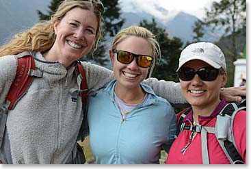 Friends from London, Tina, Alix and Lauren smile at the end of the trail.