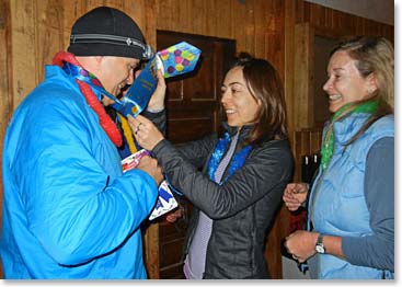 Jeremy gets some help from his wife with his birthday tie.