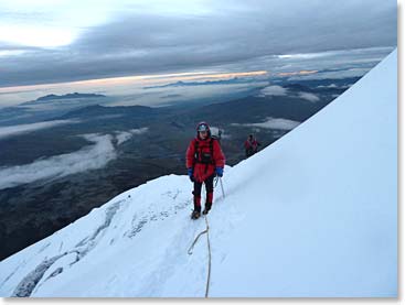 Chris climbing as the sun rises