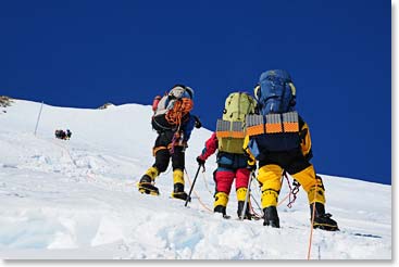 View of climbers heading up to high camp