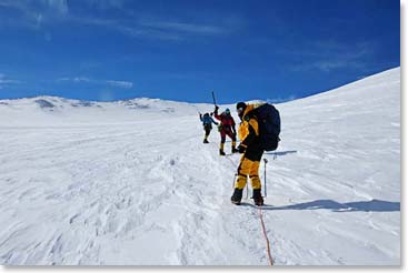 Climbers in good spirits making their way up the fixed lines