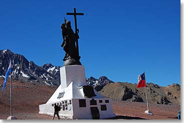 Front view of the monument with the Chilean and Argentinian flags