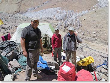 Osvaldo, Maria, and Sergio are organizing the expedition gear and preparing for our climb higher on the mountain from Plaza de Mulas.