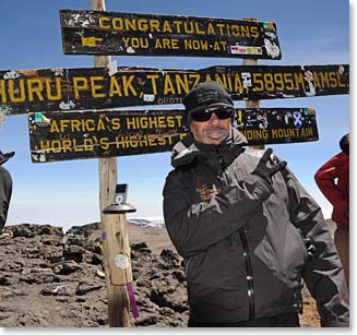 Neil on his last trip with Berg Adventures on the summit of Kilimanjaro